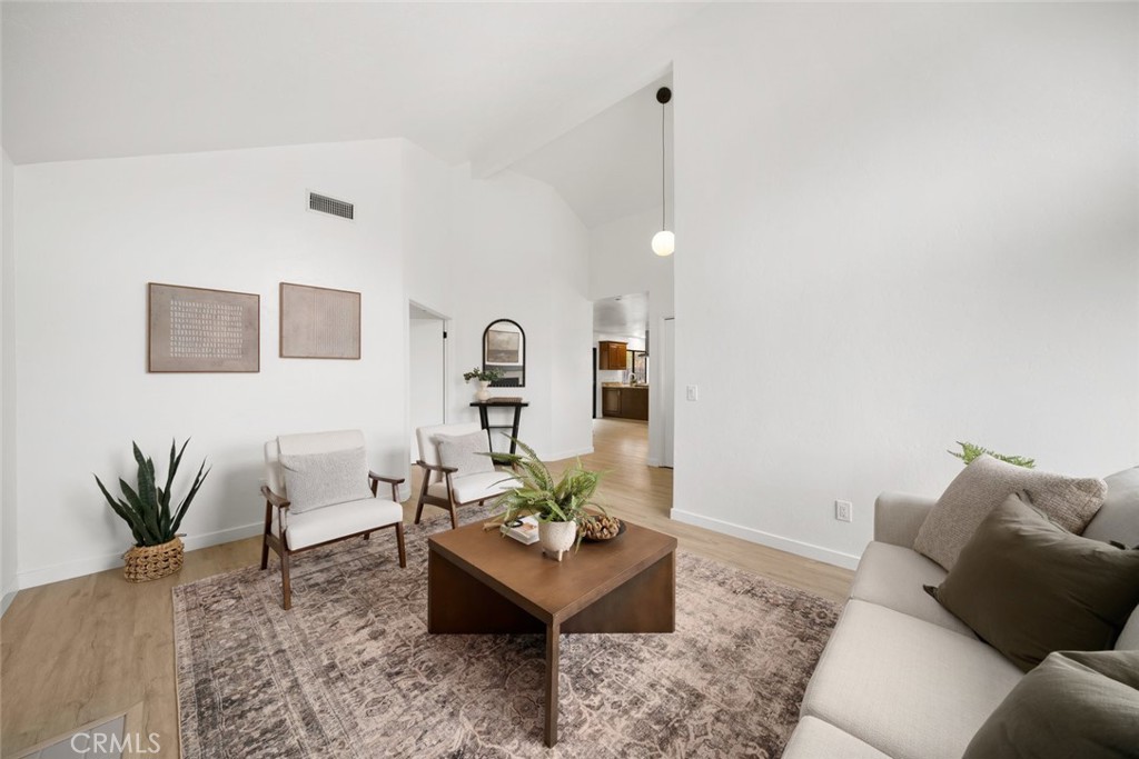 928 Austin Court Paso Robles, CA 93446 - Photo 5 of 30 a living room with furniture and a potted plant