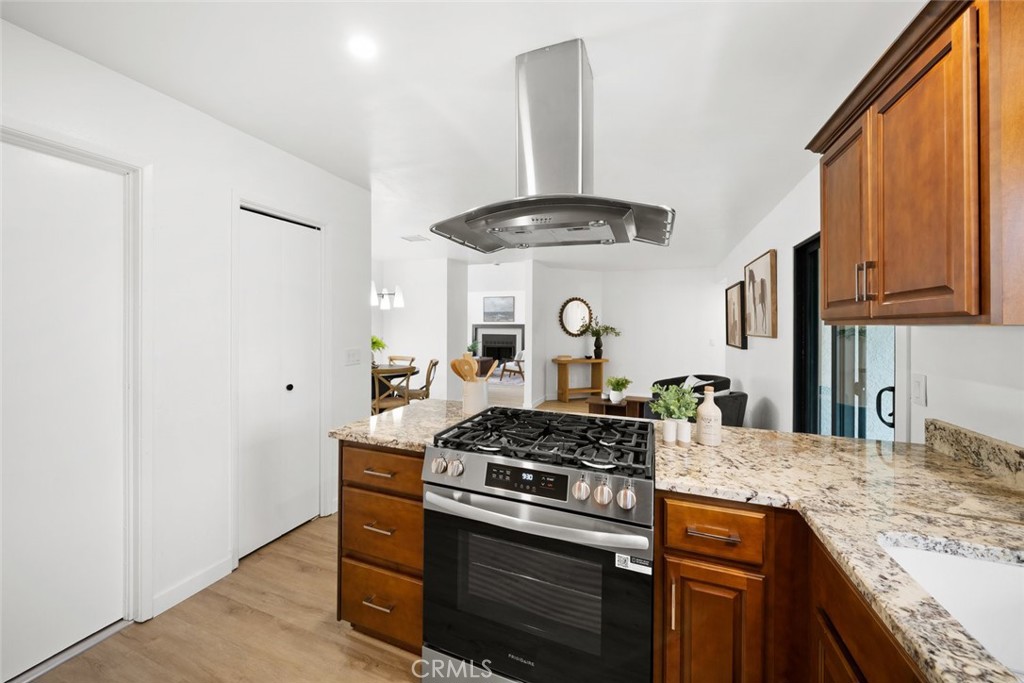 928 Austin Court Paso Robles, CA 93446 - Photo 9 of 30 a kitchen with stainless steel appliances granite countertop a stove and a sink