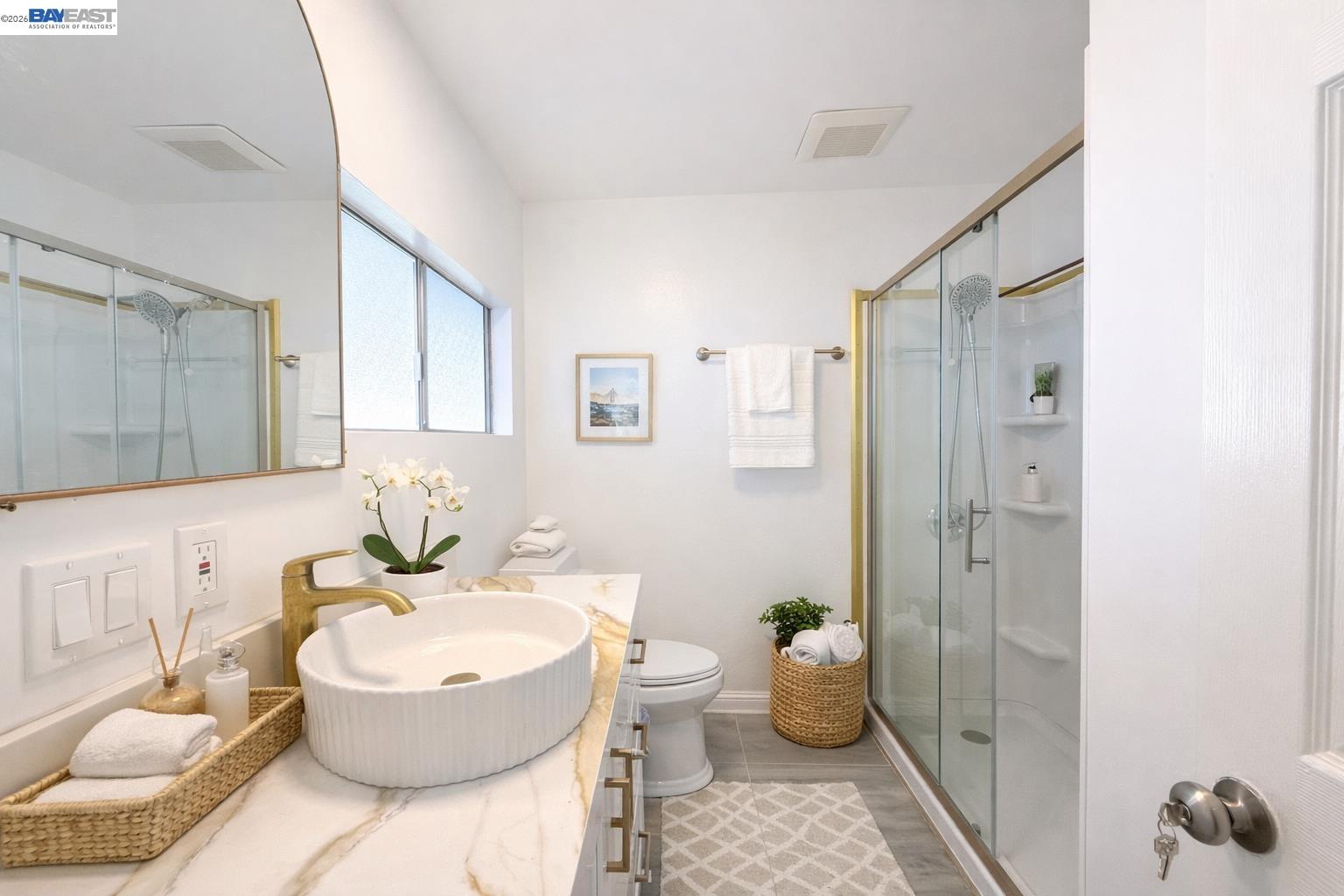 2151 Oakland Road, Unit 324 San Jose, CA 95131 - Photo 12 of 14 a bathroom with a sink toilet and shower