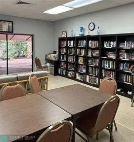 a view of a workspace with furniture