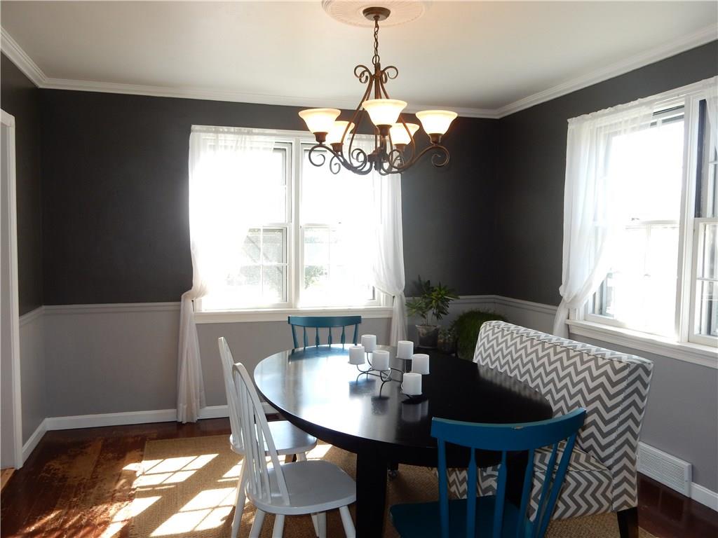 327 McClelland Road Canonsburg, PA 15317 - Photo 13 of 25 A view of the dining room with updated light fixtures and fresh paint. Look how much natural sunlight comes through those windows!