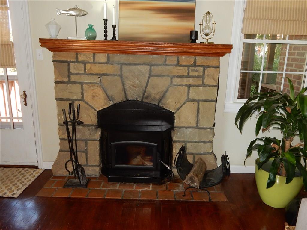 327 McClelland Road Canonsburg, PA 15317 - Photo 16 of 25 Beautiful stone fireplace with a log burning buck stove insert.