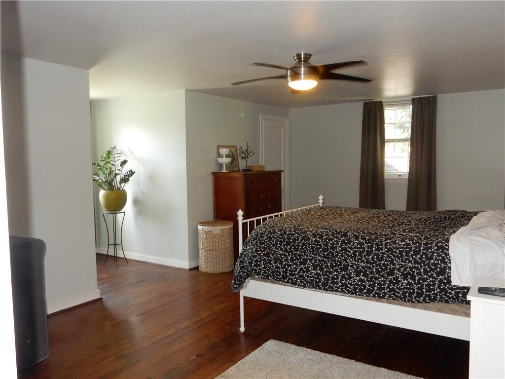327 McClelland Road Canonsburg, PA 15317 - Photo 18 of 25 This is the master bedroom, it is huge with lots of closet space and a beautiful window that I would find the most comfy chair for and it would be my favorite place to read. Hardwood floors and ceiling fan