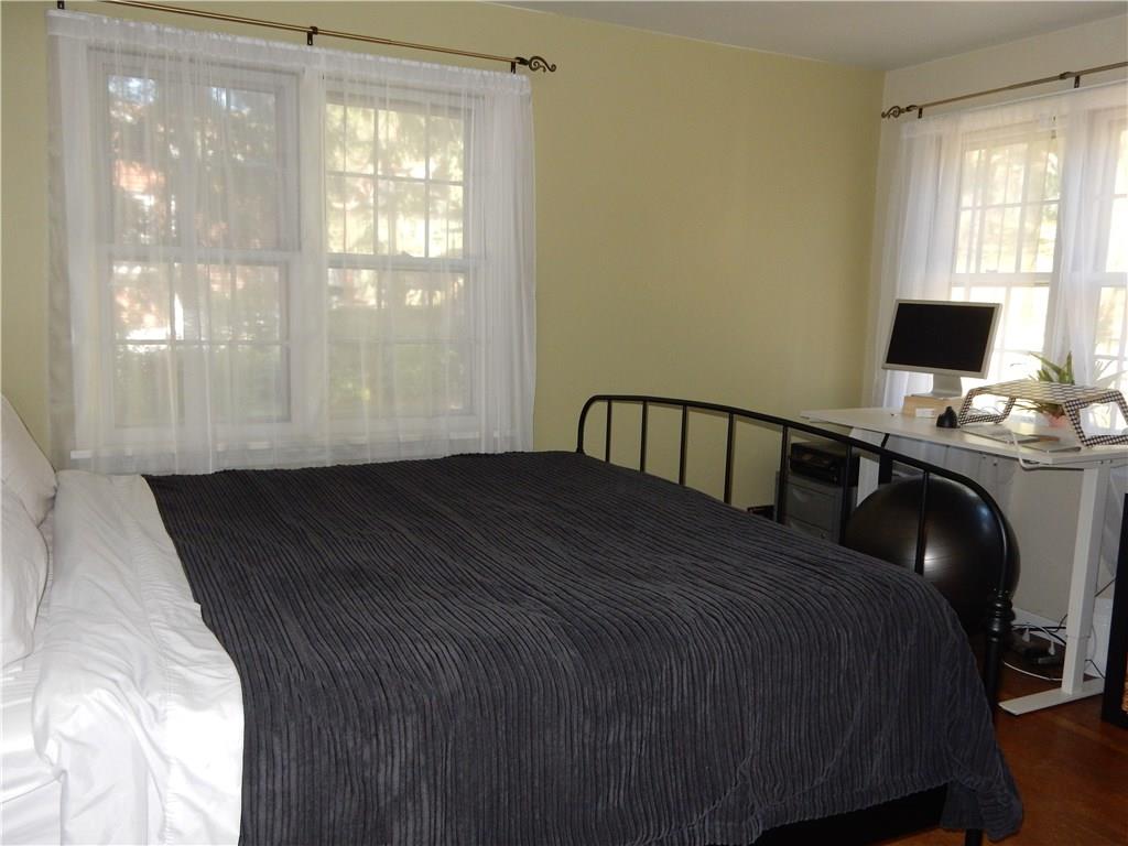 327 McClelland Road Canonsburg, PA 15317 - Photo 21 of 25 This bedroom could be used as a master if you prefer a first floor bedroom, large closet, hardwood floors, neutral paint color and again with all of that natural light!