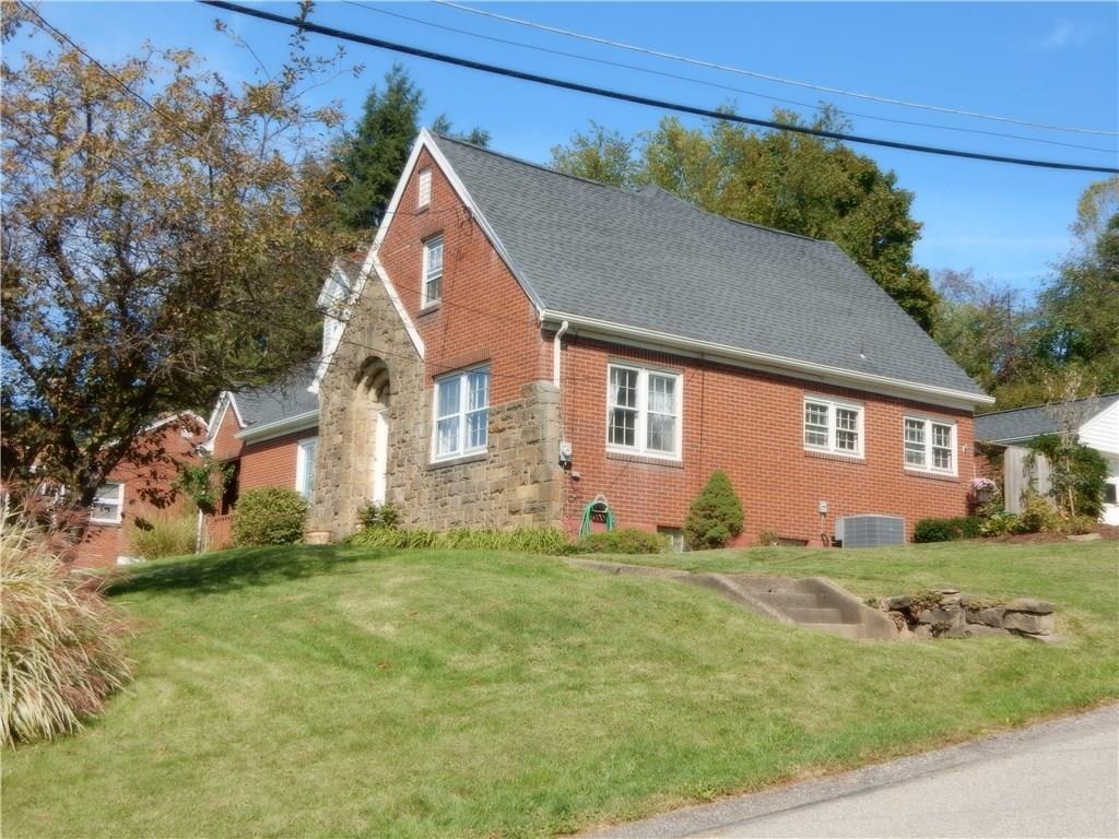 327 McClelland Road Canonsburg, PA 15317 - Photo 5 of 25 A side view of the home, beautiful stone and brick front