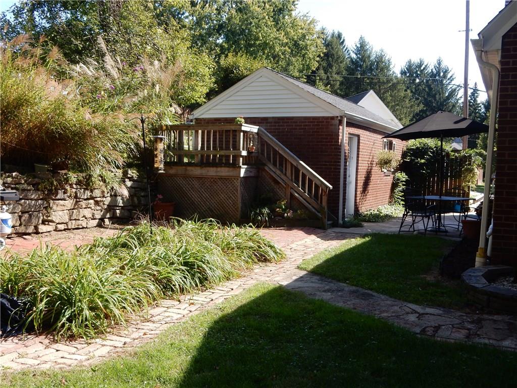327 McClelland Road Canonsburg, PA 15317 - Photo 8 of 25 Private patio for entertaining and gardening. Beautiful stone sidewalk that leads to the side porch.