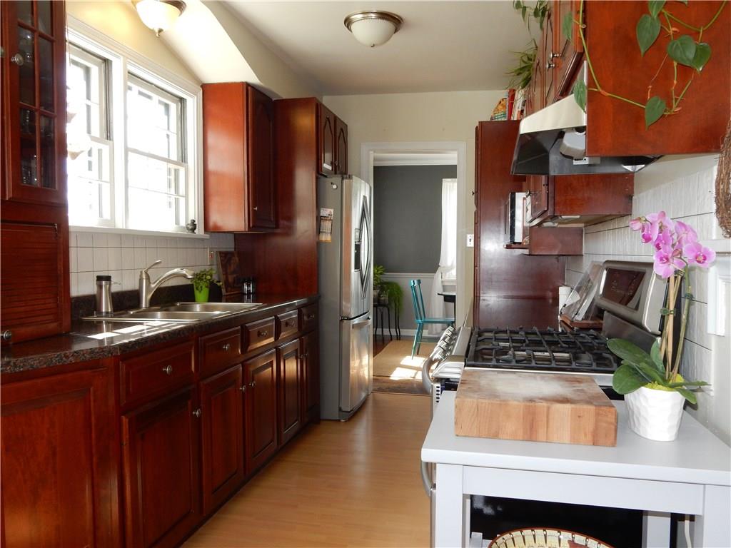 327 McClelland Road Canonsburg, PA 15317 - Photo 10 of 25 Love to cook! Look how nice this galley kitchen is! Beautiful cherry cabinets and lots of counter space.