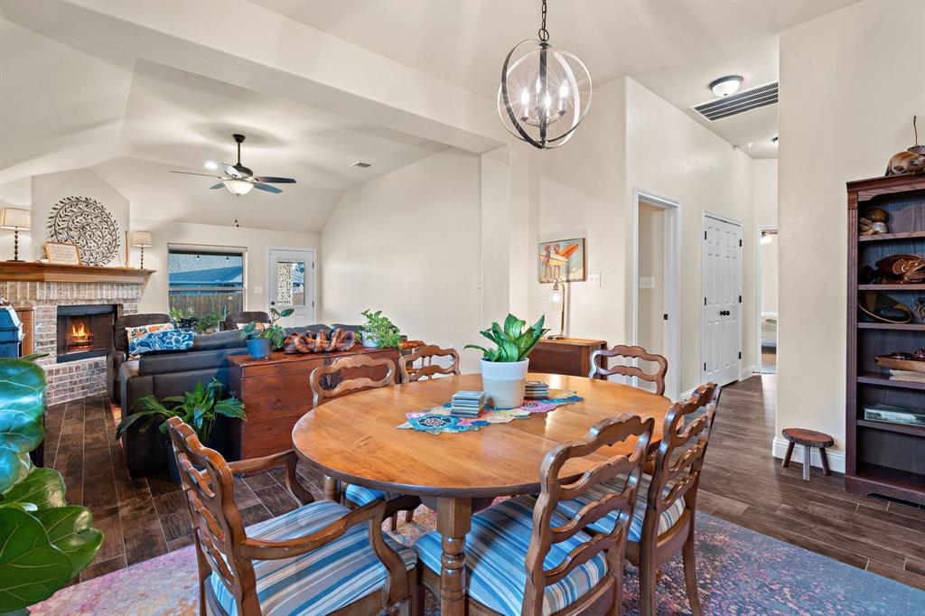 904 Sam Street Springtown, TX 76082 - Photo 13 of 30 a view of a dining room with furniture