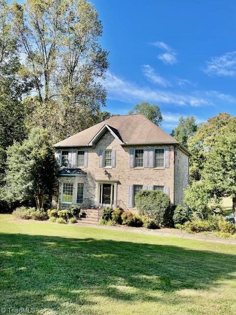 Three side brick house with basement garage