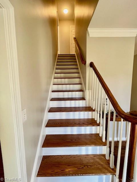 6103 Trotter Ridge Road Summerfield, NC 27358 - Photo 15 of 34 Hardwood stairs to second level.