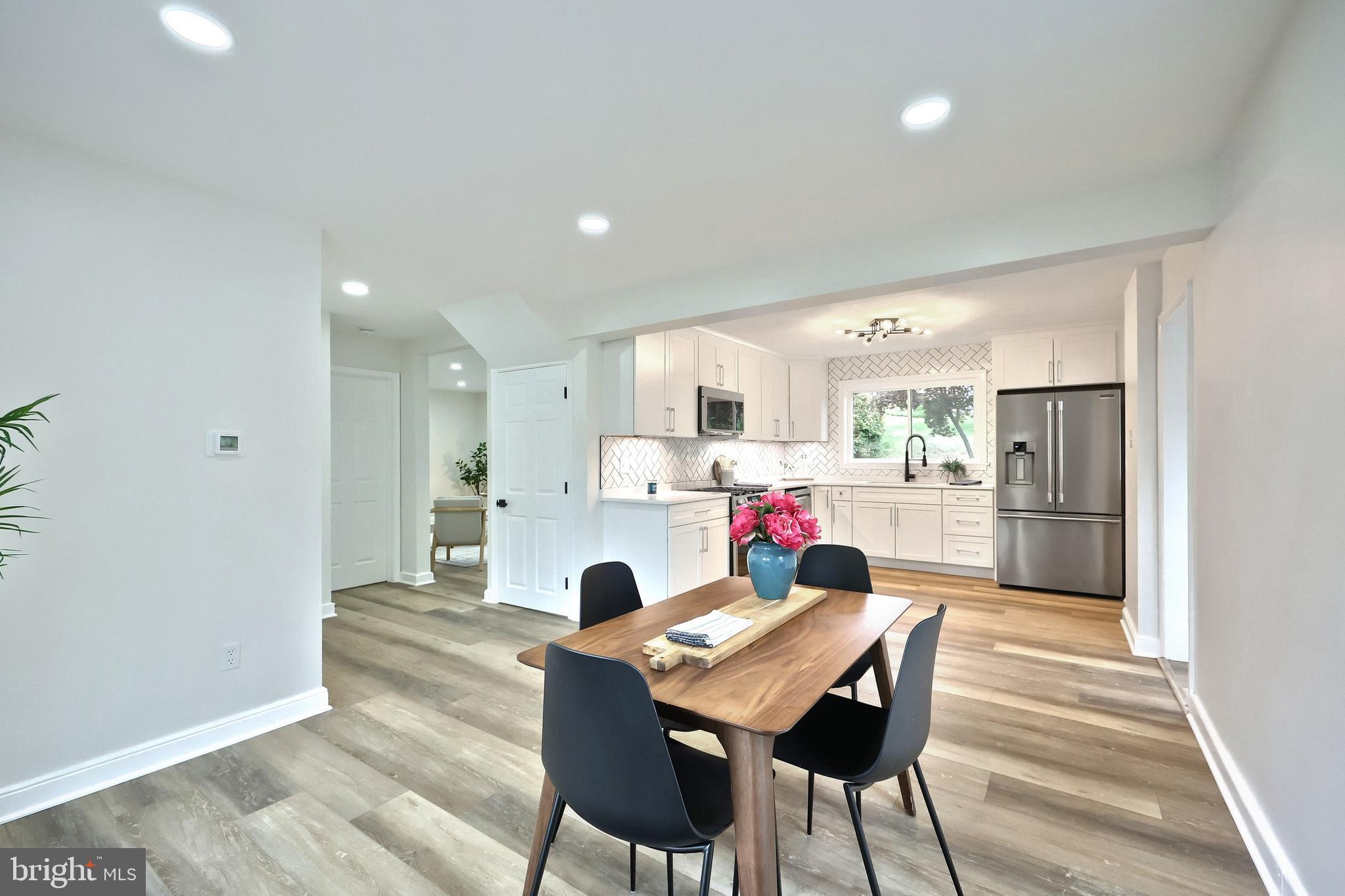 3641 River Road Conestoga, PA 17516 - Photo 26 of 61 a view of a dining room with furniture and wooden floor