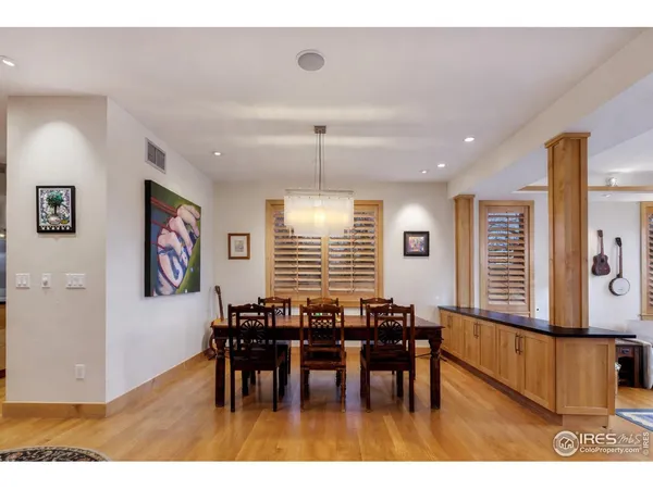 a bathroom with a granite countertop sink mirror and a