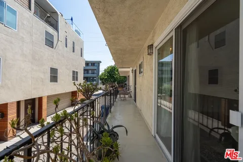 a balcony view with furniture