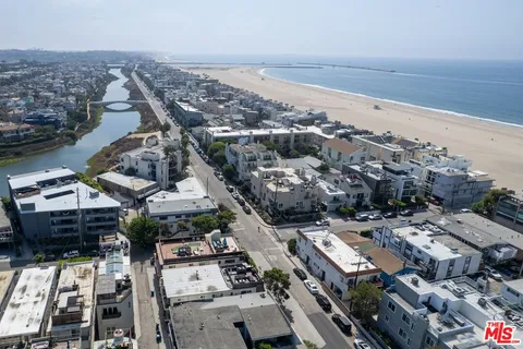 an aerial view of a city with lots of residential buildings