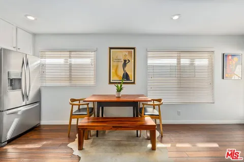 a reading room with furniture and a window