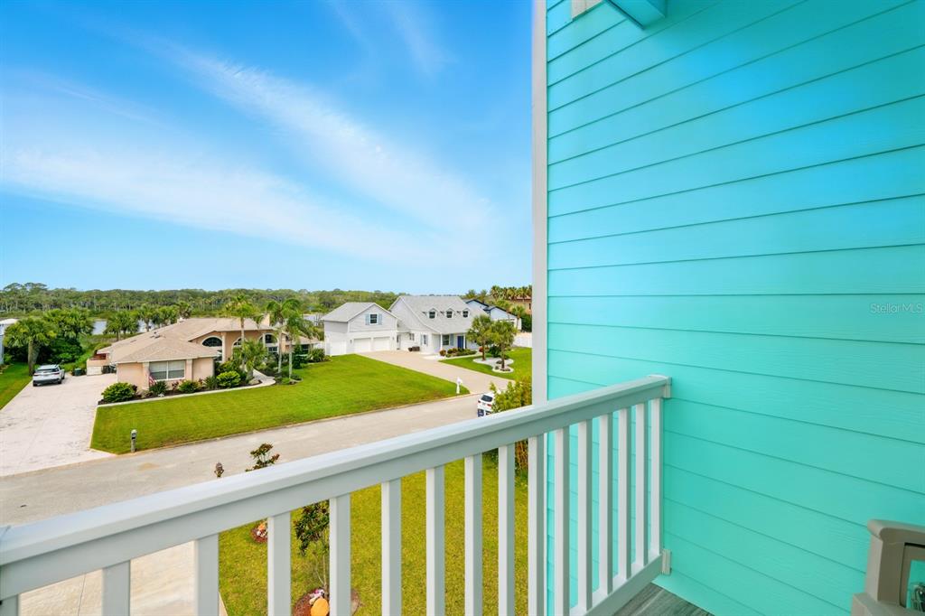 3073 Painters Walk Flagler Beach, FL 32136 - Photo 20 of 66 a view of a balcony with an outdoor space