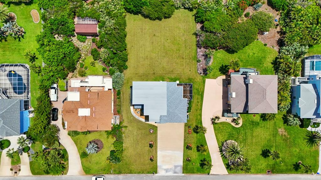 3073 Painters Walk Flagler Beach, FL 32136 - Photo 63 of 66 an aerial view of residential houses with outdoor space and street view