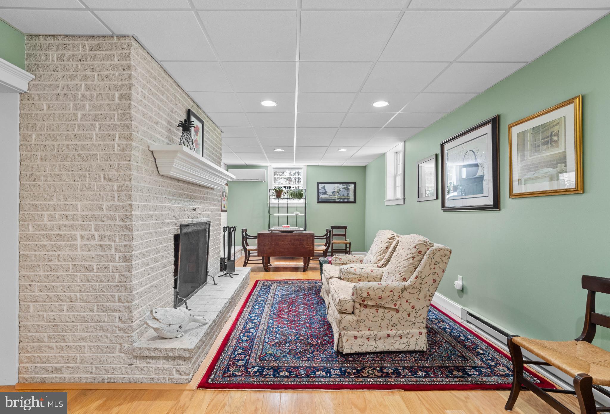 1036 Ulrich Road Julian, PA 16844 - Photo 11 of 40 Lower Level Family room w/wood Fireplace
