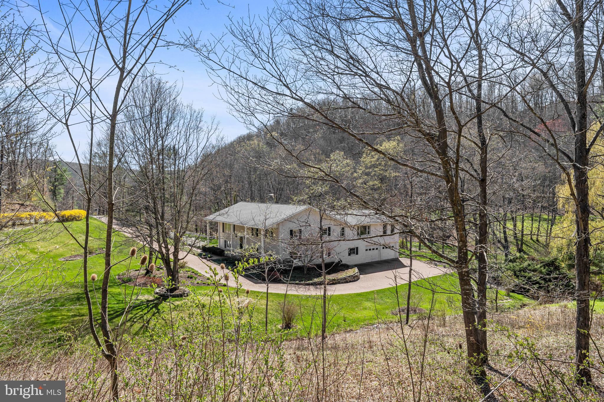 1036 Ulrich Road Julian, PA 16844 - Photo 40 of 40 L-shaped paver driveway to lower level 2 Car Gar