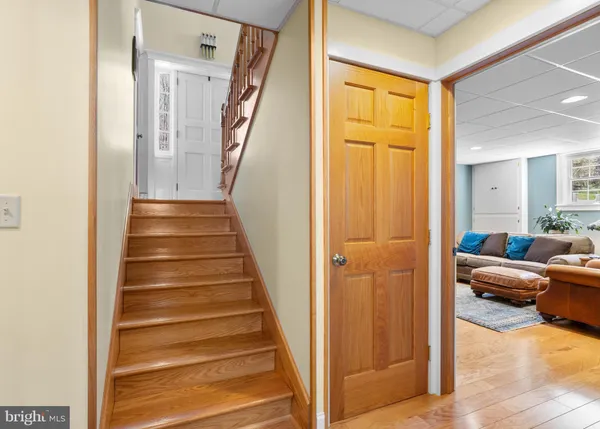 a view of a livingroom with furniture and entryway