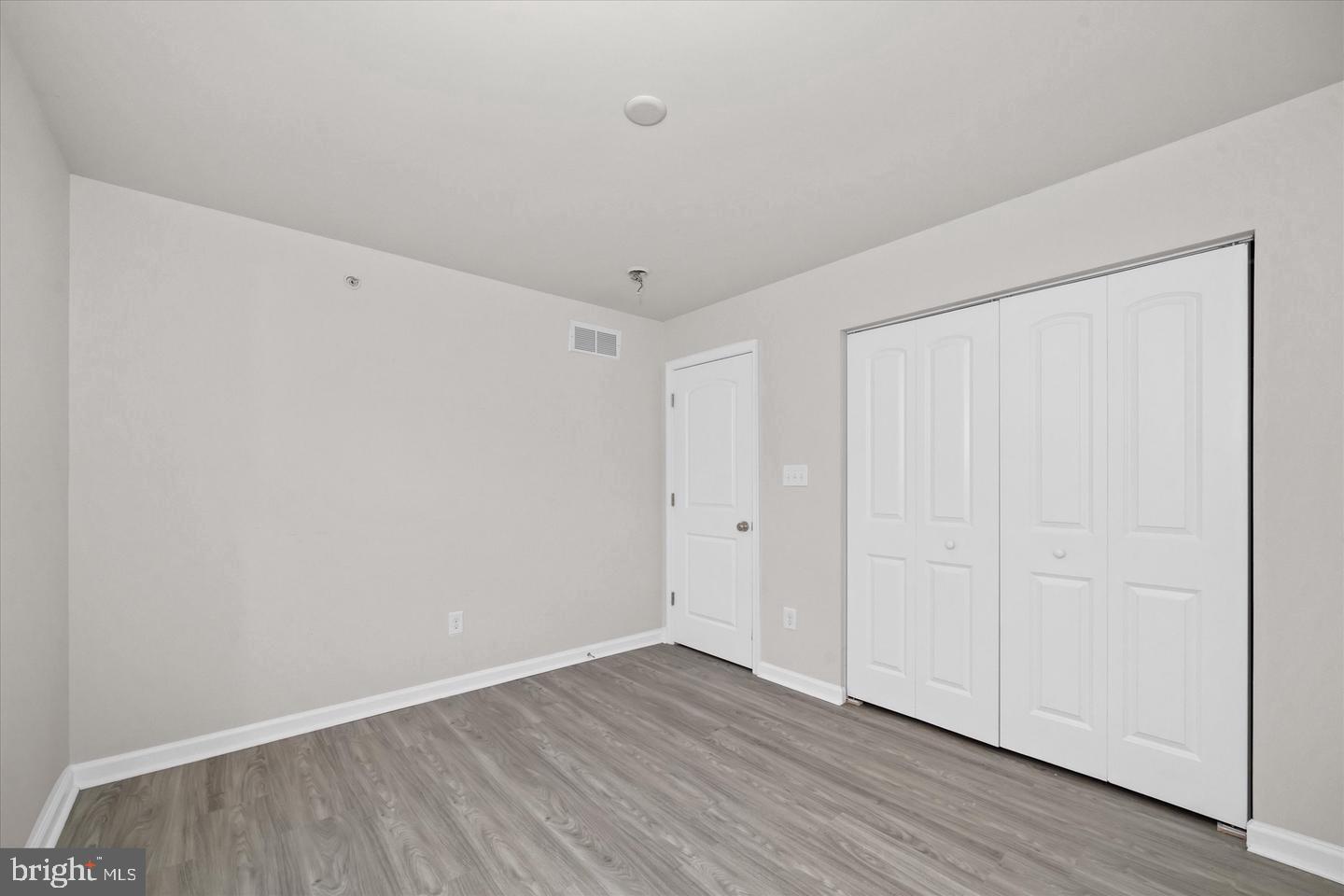 26 Munro Road Newark, DE 19711 - Photo 13 of 22 a view of an empty room with wooden floor
