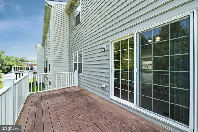 a view of a balcony with a large window