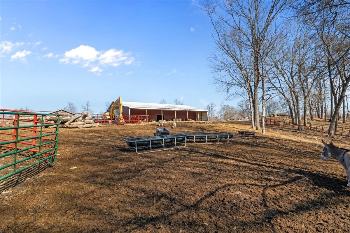 1429 Hunley Branch Road Charlotte, TN 37036 - Photo 19 of 51 a view of a house with a yard