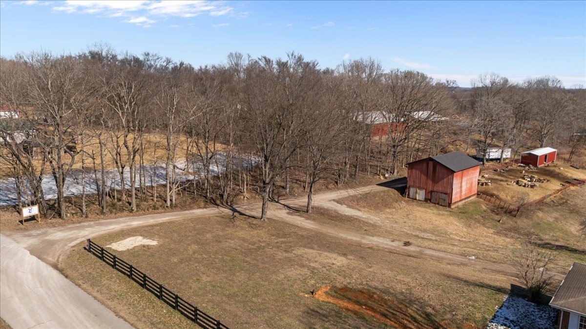 1429 Hunley Branch Road Charlotte, TN 37036 - Photo 2 of 51 a view of a road with a building in the background