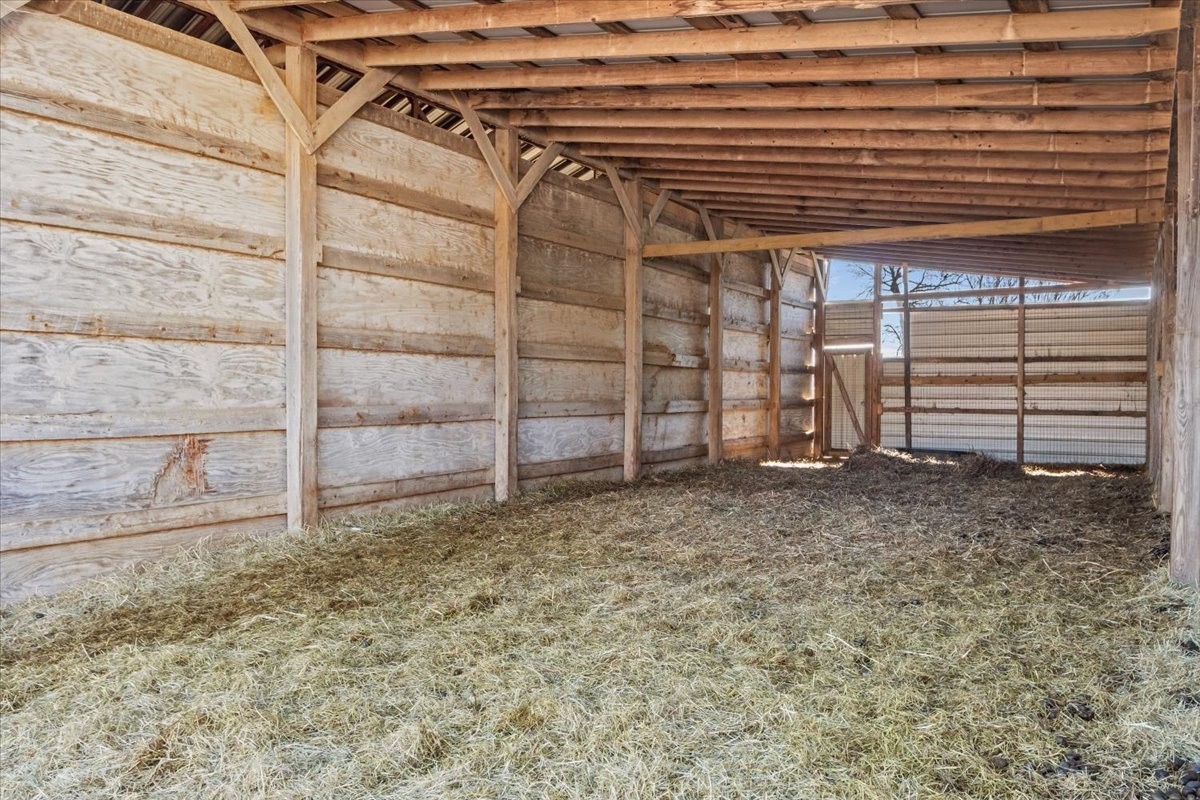 1429 Hunley Branch Road Charlotte, TN 37036 - Photo 24 of 51 a view of a room with wooden walls