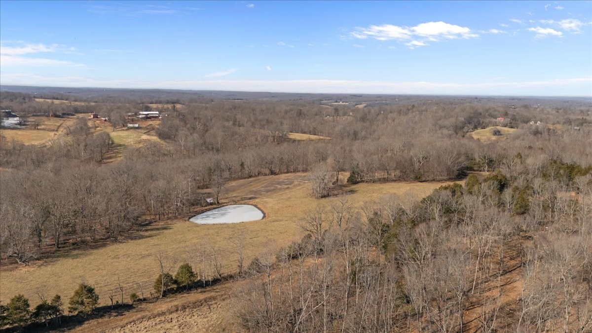 1429 Hunley Branch Road Charlotte, TN 37036 - Photo 44 of 51 an aerial view of residential houses with outdoor space