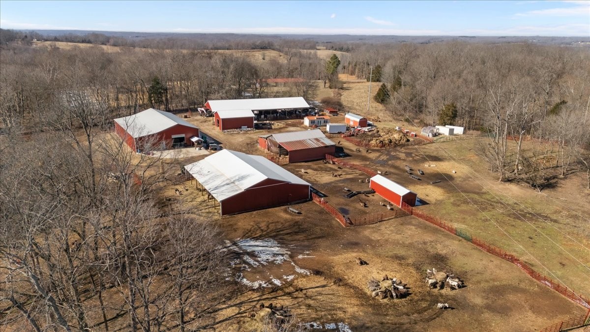 1429 Hunley Branch Road Charlotte, TN 37036 - Photo 50 of 51 an aerial view of a house with a yard and lake view