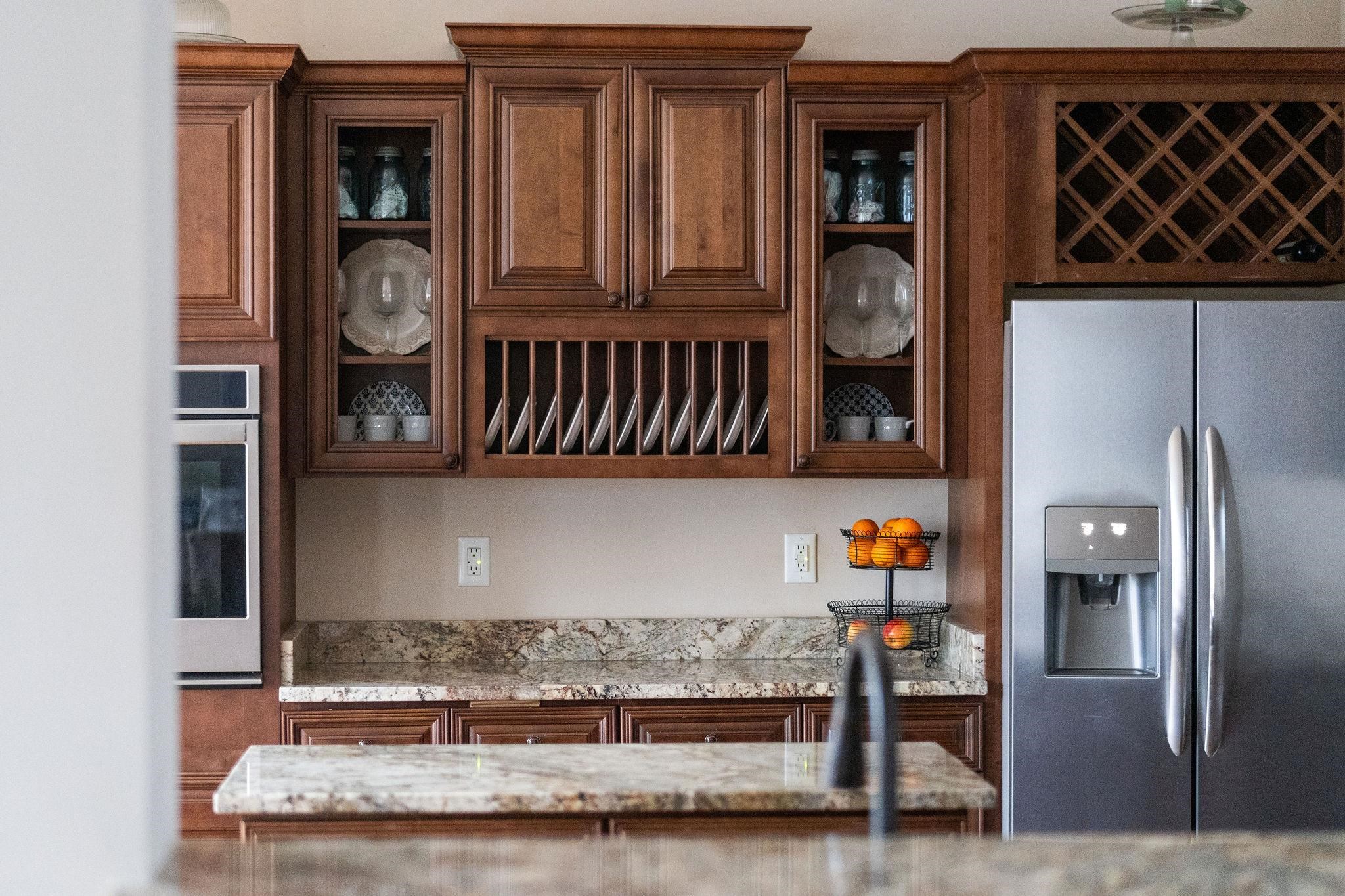 114 Jaspers Lane Stuarts Draft, VA 24477 - Photo 11 of 41 a kitchen with granite countertop a refrigerator and a stove