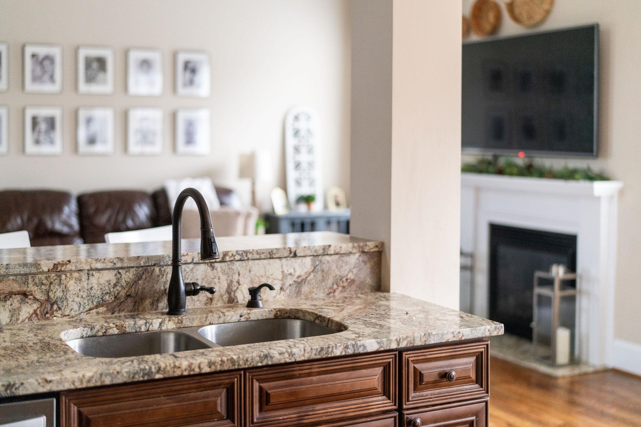 114 Jaspers Lane Stuarts Draft, VA 24477 - Photo 9 of 41 a kitchen with granite countertop a sink and a stove