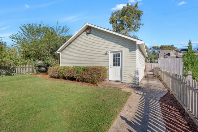 a view of a backyard with a garden