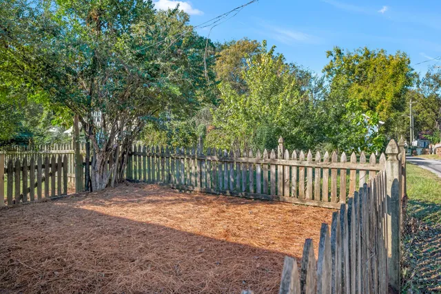 a view of a wooden fence