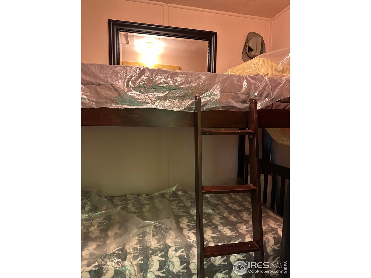 414 Riverside Drive Lyons, CO 80540 - Photo 22 of 23 a bathroom with a sink and a mirror