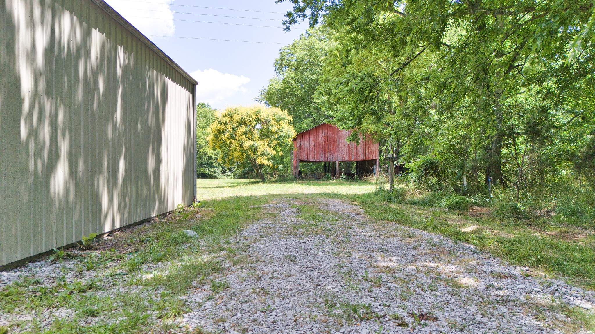 820 Edwards Road Russellville, KY 42276 - Photo 13 of 23 a view of a backyard with a garden