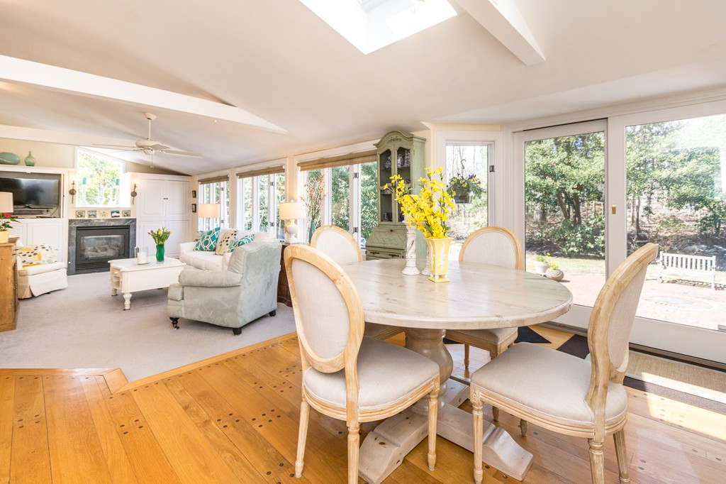 51 Deep Run Cohasset, MA 02025 - Photo 15 of 30 a view of a dining room with furniture a chandelier and wooden floor