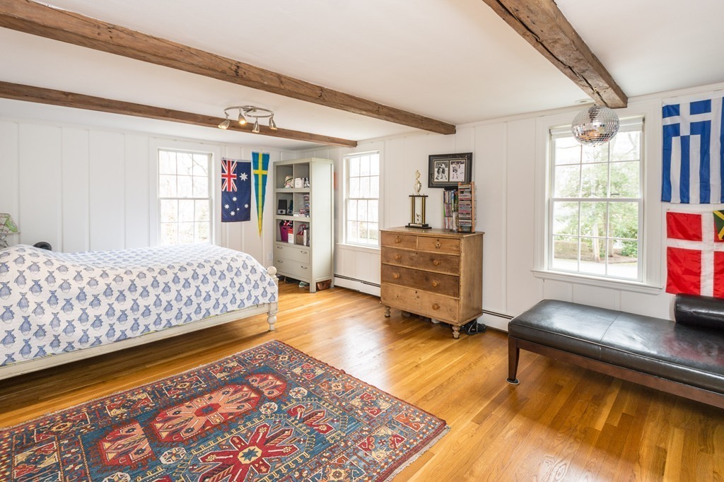 51 Deep Run Cohasset, MA 02025 - Photo 29 of 30 a bedroom with a bed and wooden floor