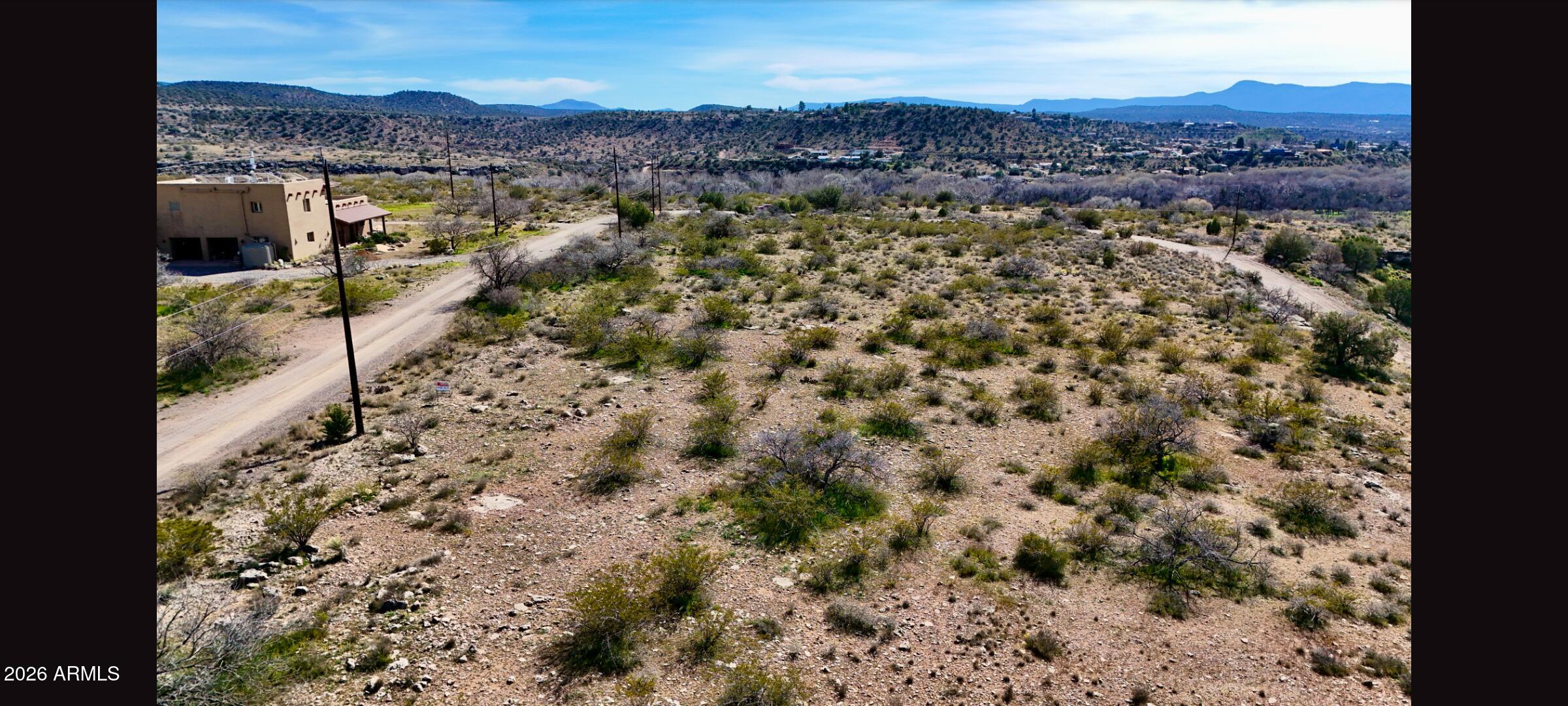 4954 East Goss Road, Unit 694 Rimrock, AZ 86335 - Photo 5 of 6 a view of a city with mountain