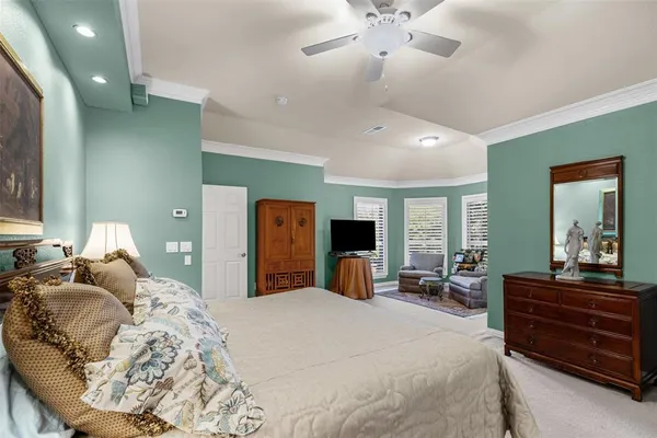 a bedroom with a bed and furniture