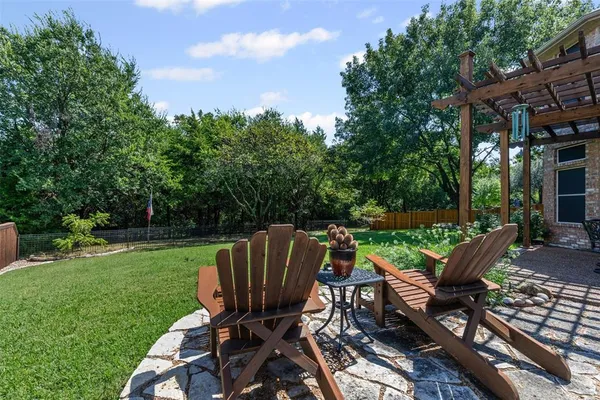 a view of a patio with chair and table