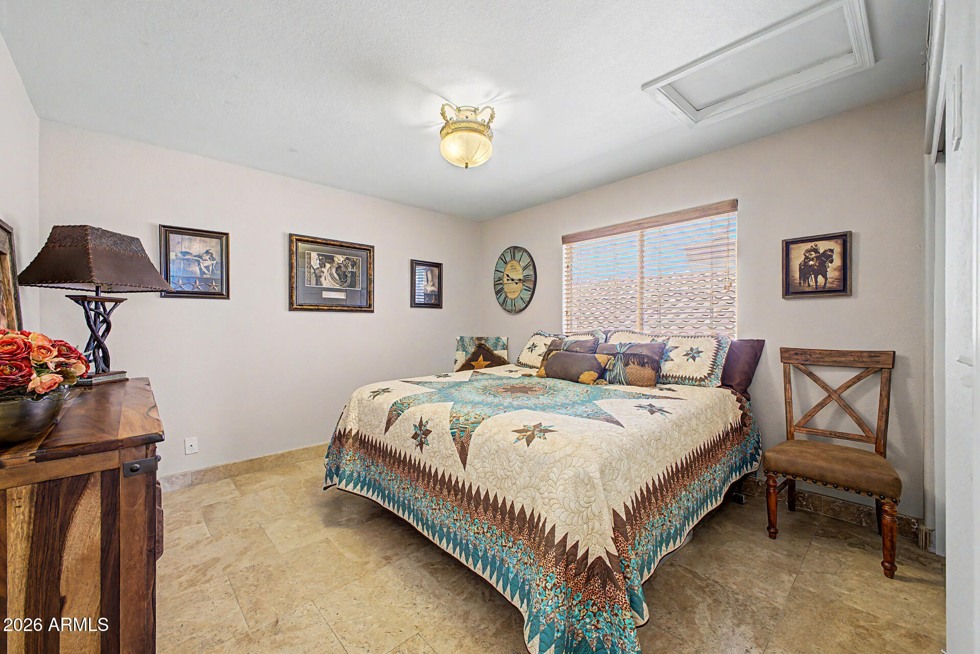 3948 North Ranier Mesa, AZ 85215 - Photo 28 of 69 a bed room with a bed and a chandelier