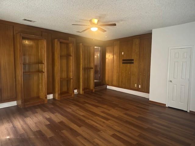 7152 Indian Ridge Trail Dallas, TX 75232 - Photo 16 of 17 an empty room with wooden floor and closet area