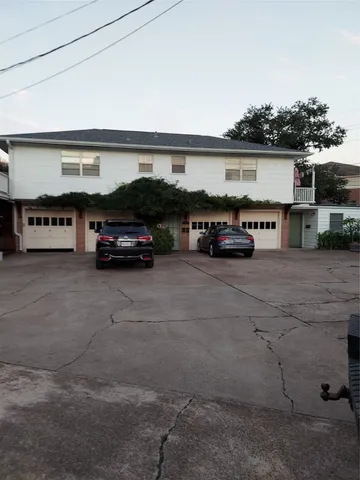 a view of a cars parked in garage