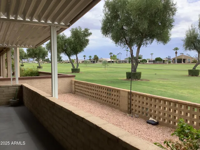 a view of a garden with an outdoor space