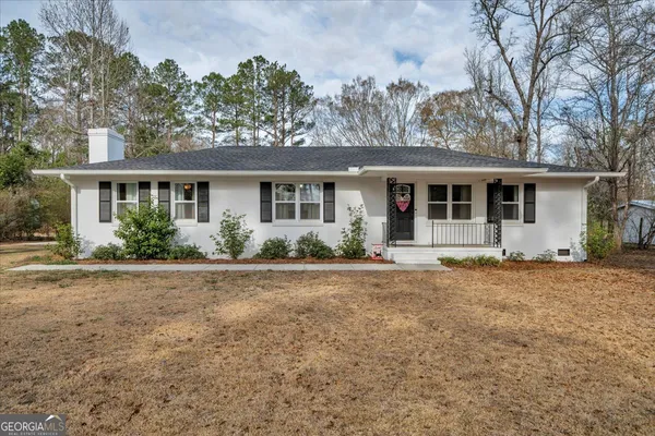 front view of a house and a yard