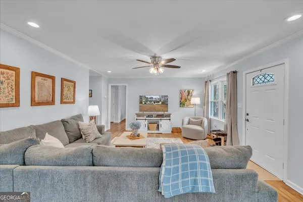 a living room with furniture and a couch