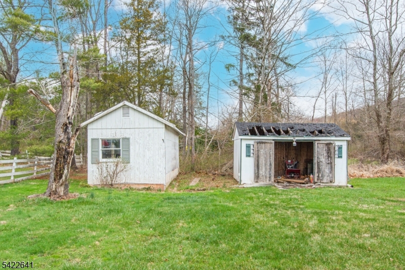 570 Mine Brook Road Bernardsville, NJ 07924 - Photo 29 of 38 a front view of house with yard and green space