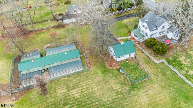 570 Mine Brook Road Bernardsville, NJ 07924 - Photo 32 of 38 an aerial view of residential houses with outdoor space